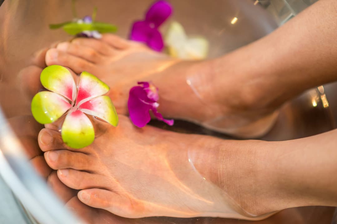 picture of feet soaking in a warm massage water 